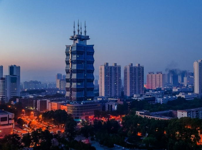永乐高系统与洛阳市探讨产业转型发展新动能