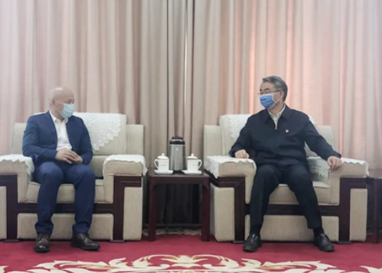 永乐高系统总裁陈士刚与河南省委秘书长穆为民会晤